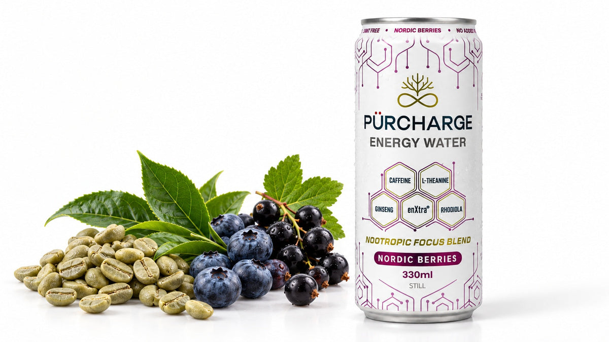 Green coffee beans, tea leaves and fruit beside a can of PÜRCHARGE natural energy drink